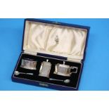 A boxed silver condiment set; weight 4.2oz/131.7gm