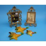 A Gilt easel mirror, a photograph frame and a set