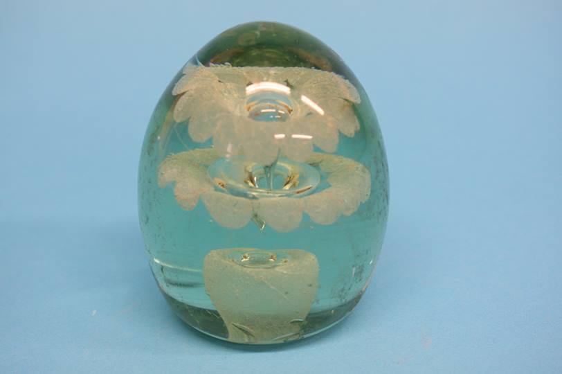 A Victorian green glass dump with two tier flower