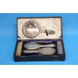 A silver six piece boxed dressing table