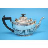 A semi-fluted and engraved teapot, Birmingham 1904, makers mark Thomas Ducrow. Total weight 11oz/