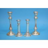 A pair of silver candlesticks, Birmingham 1971, makers mark Broadway and Co. and a smaller pair of