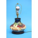 A modern Moorcroft squat shaped table lamp