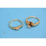 Two 14ct gold and diamond rings