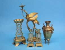 A Chinese brass and jade 3 part altar piece, each candlestick inset with a piece of carved and