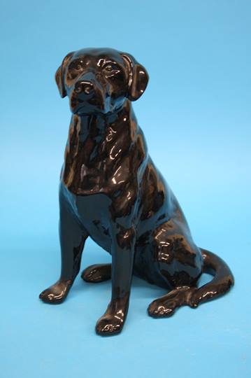 A Beswick black Labrador fireside dog, printed mar