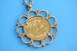 A gold sovereign dated 1890, mounted in 9ct gold and a gold 9ct chain, total weight 20.4gm