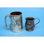 A silver tankard, Sheffield 1893, makers mark John Round and Son and another smaller tankard,