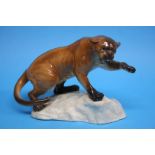 A Beswick model of a 'Cheetah' on a rock; impresse