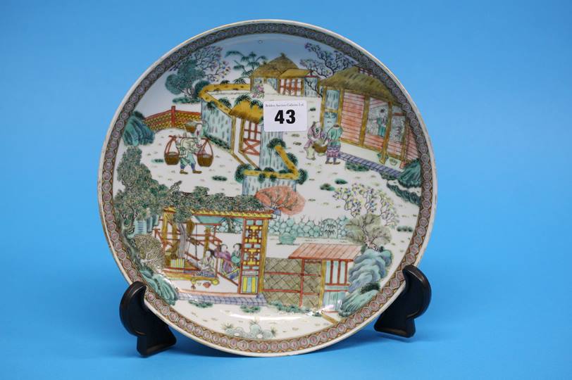 A Chinese shallow circular dish decorated with fig