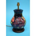 A large Moorcroft table lamp of baluster form on a