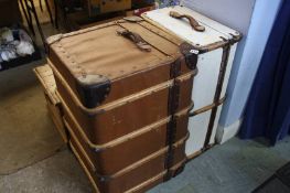 Two travelling trunks and a pine trunk