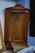 Glazed oak hanging corner cabinet