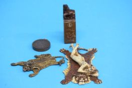 A Chinese carved Jade seal surmounted with a horse, an American coin Novelty 'John Kennedy' lighter,