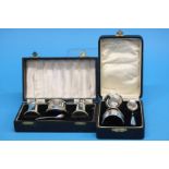 A silver 4 piece condiment set and a cased 3 piece silver christening set 3.0oz/95.1gm