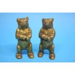 A pair of brass novelty bear money boxes. 14.5cm h