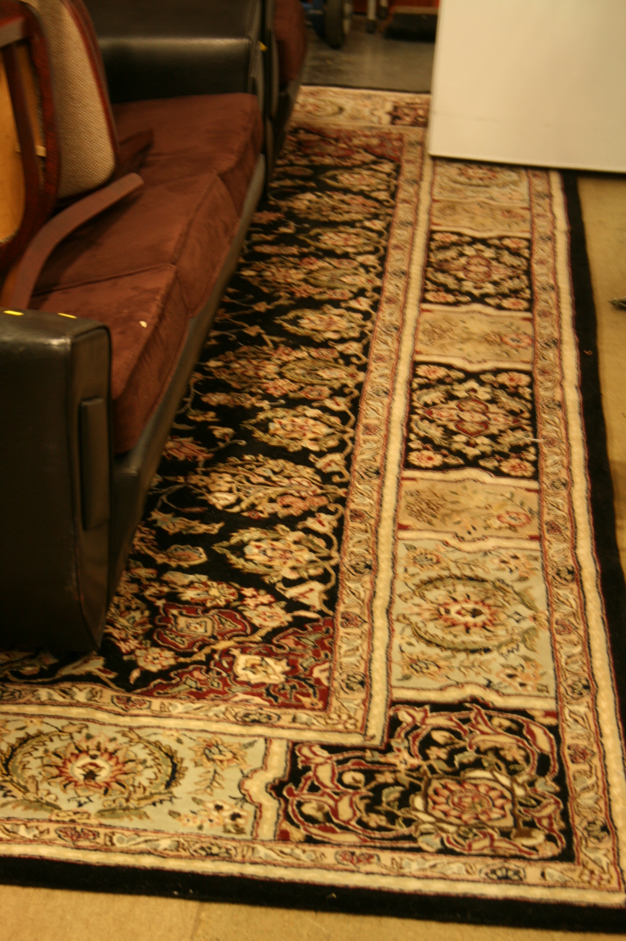 Black ground rug and a large carpet - Image 2 of 2
