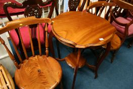 Mahogany occasional table and two chairs