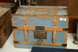 A small travelling cabin trunk