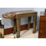 Carved wood stool in the form of a leopard
