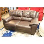 Brown leather settee