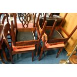 Four teak dining chairs