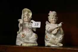 Pair of Continental 'Nodding' figures