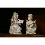 Pair of Continental 'Nodding' figures