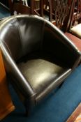 Brown tub chair