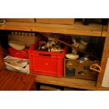 Shelf of assorted china, books, child's push bike etc.