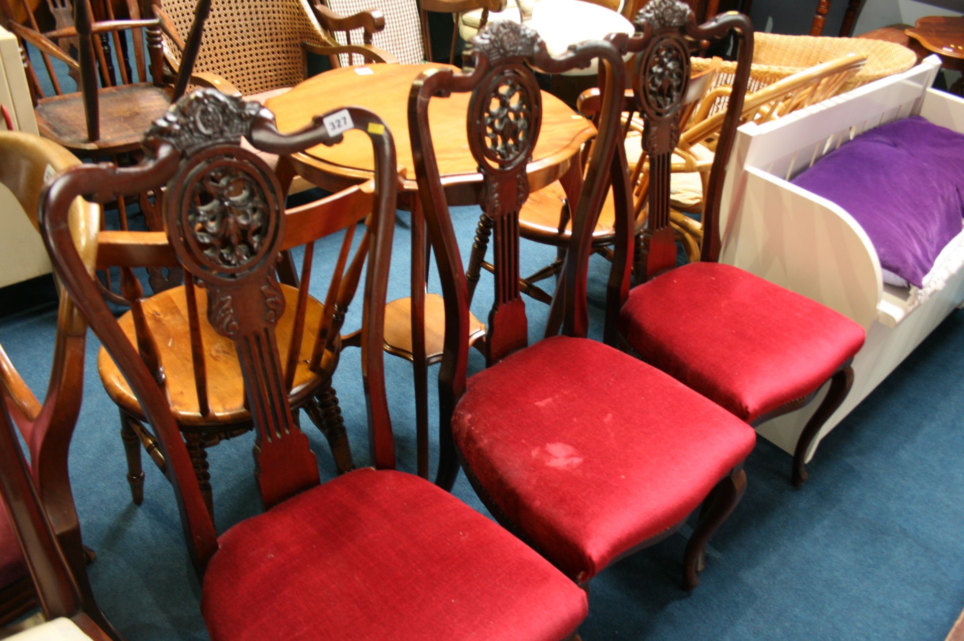 Three mahogany chairs