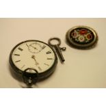 Silver pocket watch and a brooch