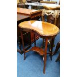 An Edwardian mahogany kidney shape occasional table