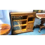 An oak linen fold bookcase. 92 cm wide