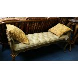 A French style green painted and gilt window seat