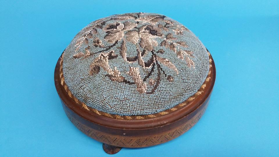 A Victorian beadwork circular footstool, 27cm diam