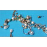 Two pairs of pearl earrings, a pearl and silver ri