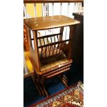 An Ercol magazine rack and a tiled nest of tables