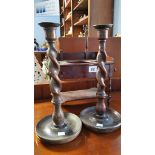 A pair of oak barley twist candlesticks and a mini