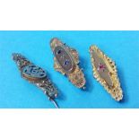 Three Victorian 9ct gold bar brooches, total weigh