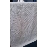 A white Durham quilt. 210 cm x 236 cm