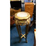 A modern gilt pedestal