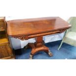 A Victorian mahogany fold over tea table