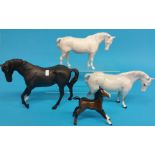 A Collection of four Beswick horses