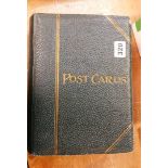 Postcard album and contents