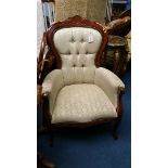 A reproduction mahogany nursing chair