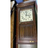 An 'Old charm' linen fold wall clock with chiming