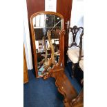 A Victorian cheval mirror