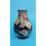 A modern Moorcroft vase, decorated with stylised f