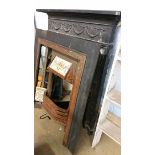 Two cast iron fire surround